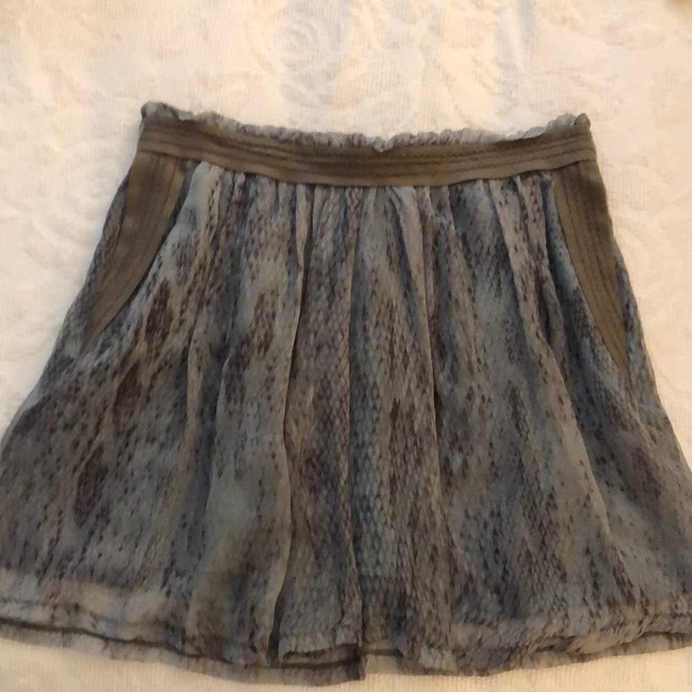 Of Two Minds silk skirt with ultra suede trim and pockets. Elastic waist, lined